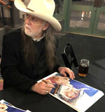 Aaron Barker signing fine art print by artist Robert Hurst