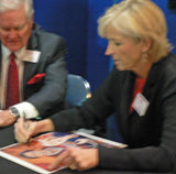 Nell Fortner signing fine art print by Robert Hurst