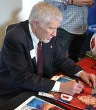 Loyd Phillips signing official Texas Sports Hall of Fame print by Robert Hurst