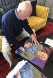 Bob McDill signing fine art print by artist Robert Hurst