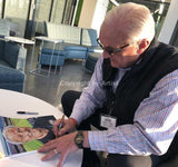 Dennis Poppe signing his CBHOF fine art print by artist Robert Hurst