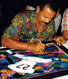 Juan Marichal signing limited edition print by Robert Hurst
