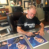 Larry Gatlin signing limited edition fine art print by artist Robert Hurst