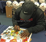 Ricky Williams signing UT Heisman Homage II fine art print by Robert Hurst