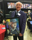 Pete Fredenburg with his Texas Sports Hall of Fame artwork by Robert Hurst