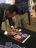 Gary Kubiak signing fine art print by Robert Hurst at Texas Sports Hall of Fame Induction 2018