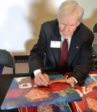 Loyd Phillips signing painting by Robert Hurst